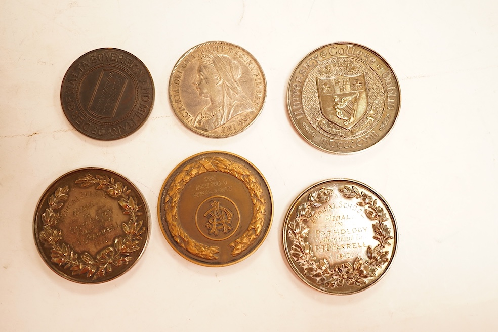 British coins and medals, Victoria, two crowns, 1887 fine, and 1899, good VF, double florin, 1887, VF, other coins and three silver University College Dublin medical school Medals, 1910, good VF